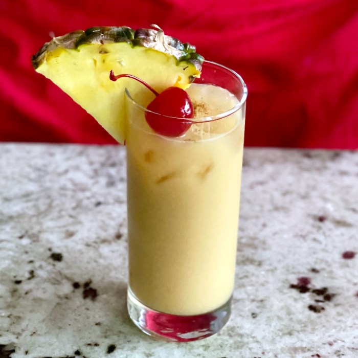 Painkiller recipe drink killer pain cheddars cheddar coconut drinks cocktail cocktails rum food ingredients pineapple dark glass ounces alcoholic pusser